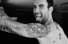 adam-levine-flower-tattoo-design.jpg