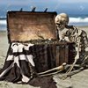 94980437-portrait-of-an-ancient-skeleton-holding-coins-from-a-pirate-treasure-chest-off-the-co...jpg